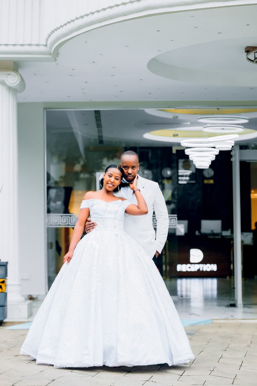 Bride and groom in front of modern venue