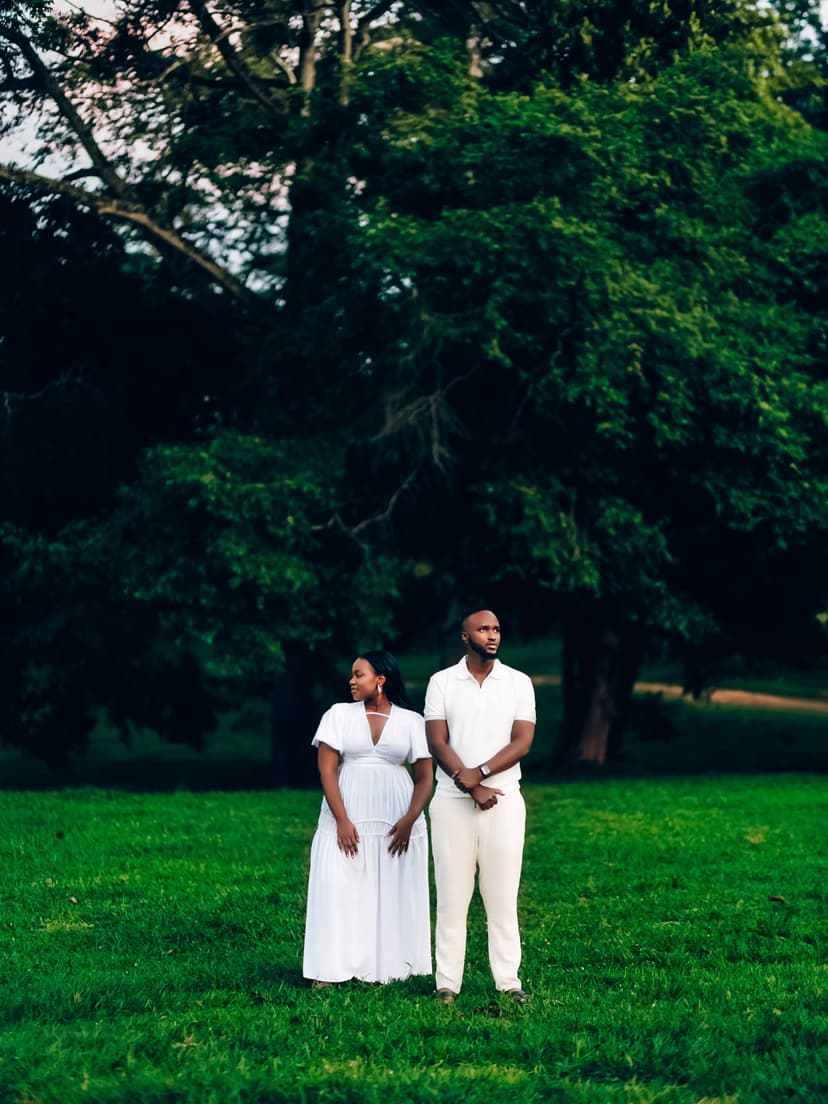 Couple in white in lush garden setting