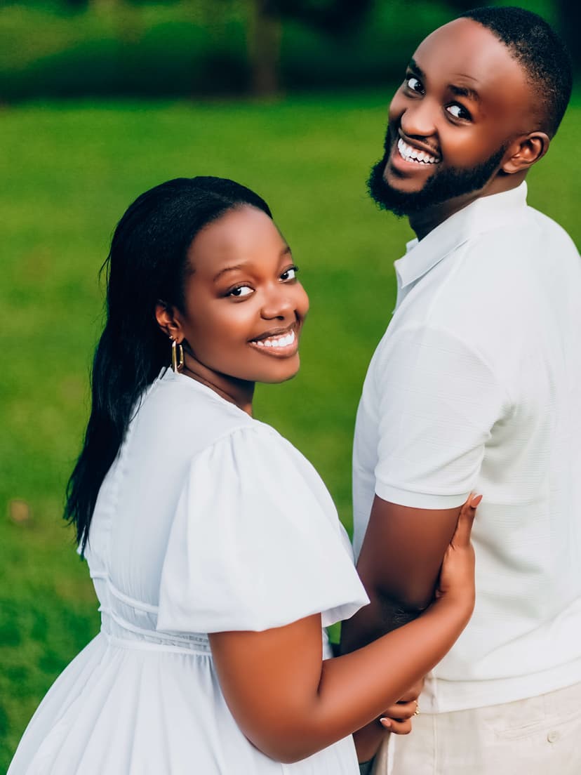 Couple smiling portrait in white clothing