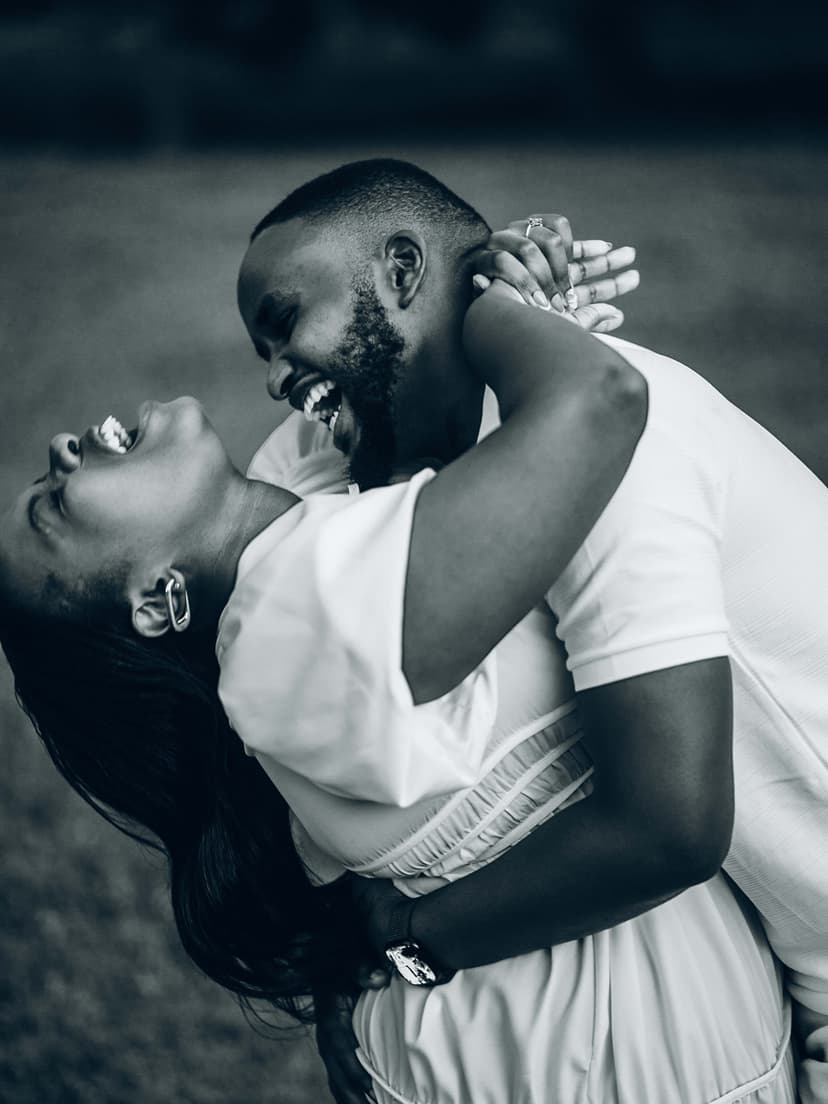 Black and white intimate kiss moment
