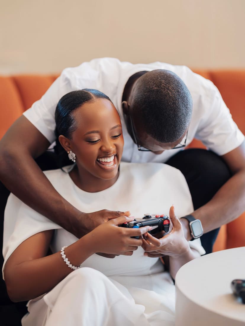 Couple laughing and playing games together